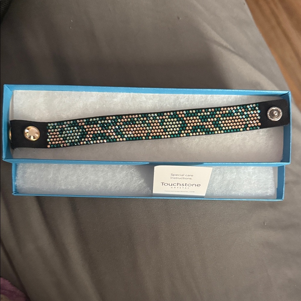 Touchstone Crystal Black Leather Bracelet with Teal and Gold Beaded Pattern